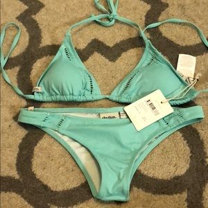 BRAND NEW!Rhythm bikini Top size Small bottoms XS